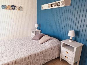 Ένα ή περισσότερα κρεβάτια σε δωμάτιο στο Holiday Home in Quiberville with Sea Views