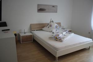 Llit o llits en una habitació de Appartements-Steinkirchner