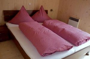 מיטה או מיטות בחדר ב-Chalet Hamito