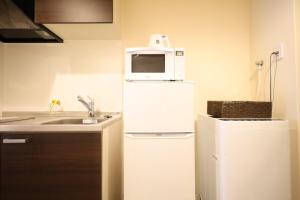 Una cocina o zona de cocina en HOTEL THE POINT Kiyomizu Gojo
