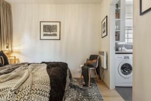 Postel nebo postele na pokoji v ubytování VAQUAY Sonder In Fitzroy