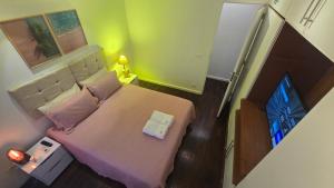 Cama ou camas em um quarto em Apartamento 3 quartos no Quadrilátero de Charme em Ipanema
