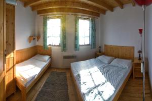 Postel nebo postele na pokoji v ubytování Chaty Tatrytip Tatralandia