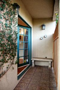 a bench sitting on the side of a building at Universal Studios-Hollywood Hills guest suite with King bed in Los Angeles