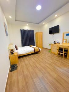 Postel nebo postele na pokoji v ubytování S481 Hoa Dang Hotel Dalat