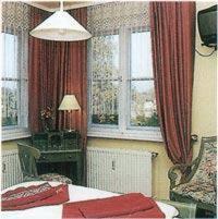 Кровать или кровати в номере Leutloff's am See
