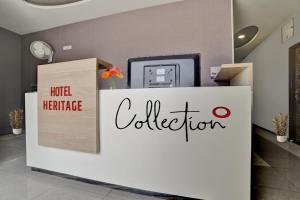 a reception area of a hotel heritage collection office at Collection O Hotel Heritage in Indore