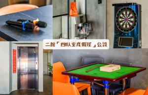 a room with a table with a dart board at 墾丁船帆石原宿 l 國旅卡特約 l 可包棟民宿 in Eluan