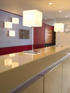 a large kitchen with two lights on a counter at Holiday Inn Express Tangshan Downtown, an IHG Hotel in Tangshan