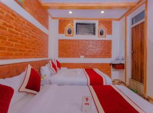 Letto o letti in una camera di Hotel Shraddha Palace