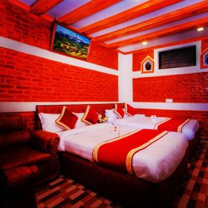 Letto o letti in una camera di Hotel Shraddha Palace