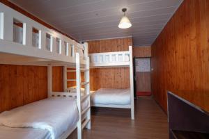 Postel nebo postele na pokoji v ubytování Poshtel, Meghma , Sandakphu