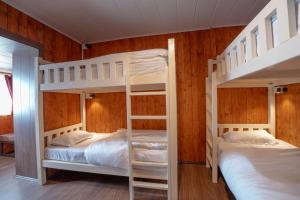 Postel nebo postele na pokoji v ubytování Poshtel, Meghma , Sandakphu