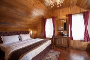 Postel nebo postele na pokoji v ubytování Poshtel, Meghma , Sandakphu