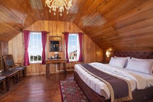 Postel nebo postele na pokoji v ubytování Poshtel, Meghma , Sandakphu