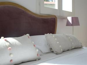 Postel nebo postele na pokoji v ubytování Maremaris B&B
