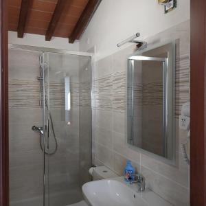 a bathroom with a shower and a sink at Bed&Breakfast Pianeta Benessere in Pistoia