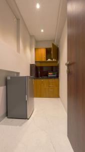 Kuchyň nebo kuchyňský kout v ubytování Magnus Nexstar Suites Kalyani Nagar