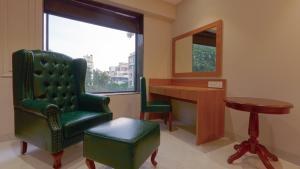 Posezení v ubytování Magnus Nexstar Suites Kalyani Nagar