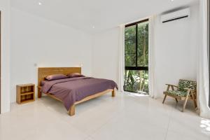 Letto o letti in una camera di New 3 BR Jungle Villa in gated community