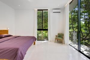 Letto o letti in una camera di New 3 BR Jungle Villa in gated community