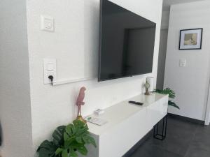 TV a/nebo společenská místnost v ubytování Elo Global Appart