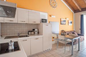 Kuchyň nebo kuchyňský kout v ubytování Residence Maroadi