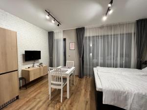 TV a/nebo společenská místnost v ubytování Double studio Petra B2-5