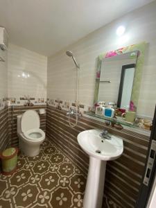 Koupelna v ubytování Cat Ba Rustic Homestay + 109 fotografií