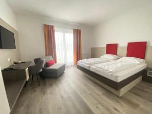 Postel nebo postele na pokoji v ubytování Simon - Hotel & Café