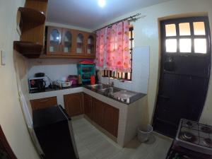 Kuchyň nebo kuchyňský kout v ubytování JM's Place + 9 fotografií