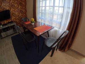 TV a/nebo společenská místnost v ubytování JM's Place