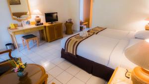 Letto o letti in una camera di Jayakarta Hotel Lombok