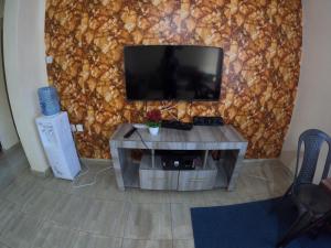 TV a/nebo společenská místnost v ubytování JM's Place