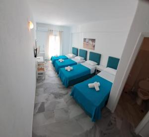 Ein Bett oder Betten in einem Zimmer der Unterkunft Frangiscos