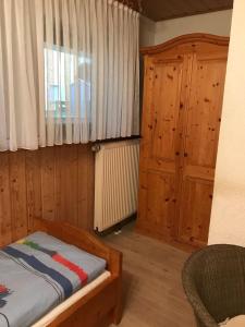 Postel nebo postele na pokoji v ubytování Pension am Eichenhain