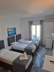 Ein Bett oder Betten in einem Zimmer der Unterkunft Frangiscos