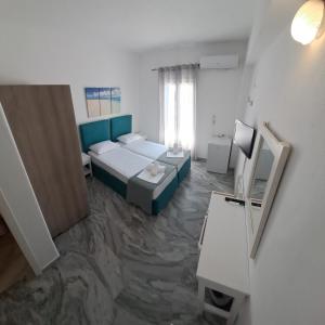 Ein Bett oder Betten in einem Zimmer der Unterkunft Frangiscos