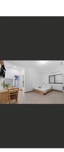 a living room with a couch and a table at Apartament Sunshine in Năvodari