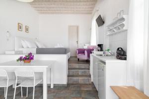 Eldhús eða eldhúskrókur á Fos Apartments Mykonos