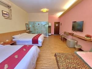 Vuode tai vuoteita majoituspaikassa 永旺旅店 Yong Wong Hostel