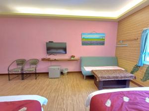 Vuode tai vuoteita majoituspaikassa 永旺旅店 Yong Wong Hostel