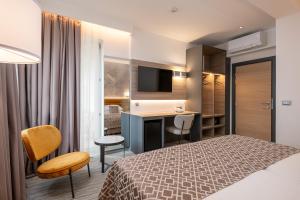 Ein Bett oder Betten in einem Zimmer der Unterkunft Hotel Ivka