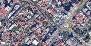 an overhead view of a city with houses and roads at SALA Apartment in Shkodër +5 photos