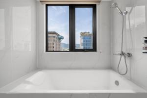 A bathroom at ViAn Hotel And Spa Danang