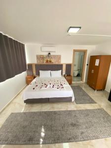 Voodi või voodid majutusasutuse Aristo 2 Butik Hotel toas