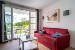 Ruang duduk di Sternoka - Appt avec vue mer avec piscine