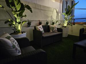 Posezení v ubytování B&B Fuori Squadro - In Centro con Terrazza Relax vista Mare