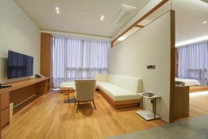 TV a/nebo společenská místnost v ubytování Hotel Ground27