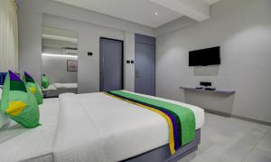 Μια τηλεόραση ή/και κέντρο ψυχαγωγίας στο Comfort Inn Baner +14 φωτογραφίες